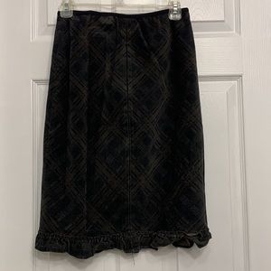 2/$10 Plaid corduroy skirt with thin elastic middle panel and ruffle hem